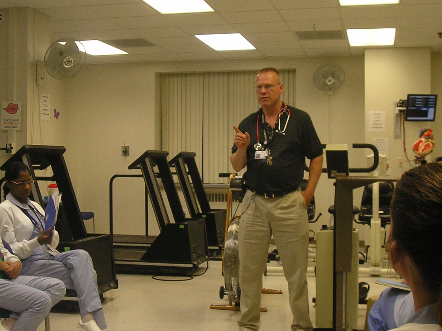 Christian Becker instructs a group of student nurses in his facility’s cardiopulmonary gym